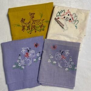 Four Antique Pillow Cases with Embroidery Designs